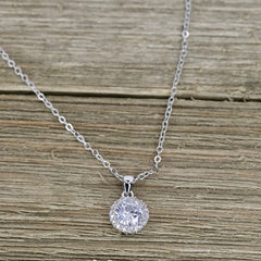 Crystal Whispers Round Pendant Necklace